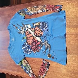 Women/Juniors size 3-5, long-sleeved Halloween- tattoo armed sleeved top.